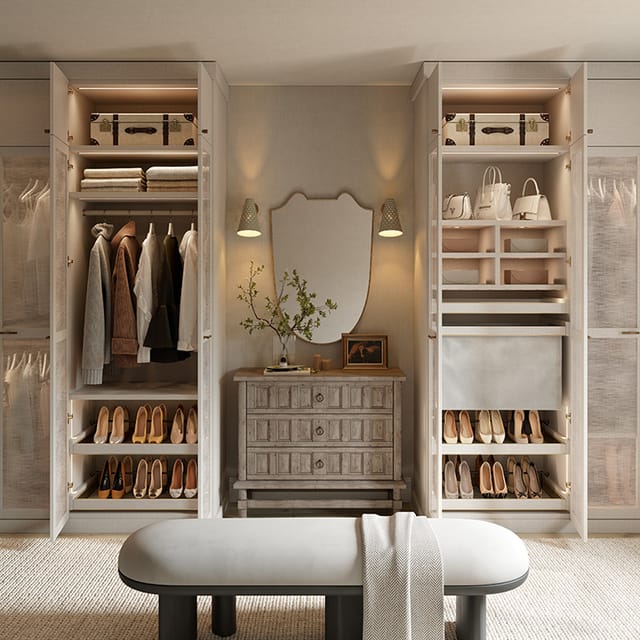 Modern closet with built-in lighting, shelves for shoes and handbags, hanging clothes, storage boxes, central dresser with mirror, and cushioned bench