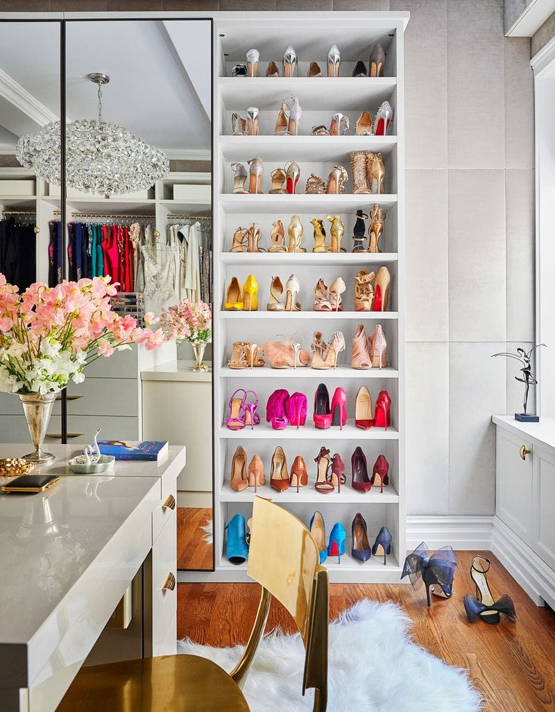 Floor to ceiling shoe shelves in custom closet for Misty Copeland designed by California Closets