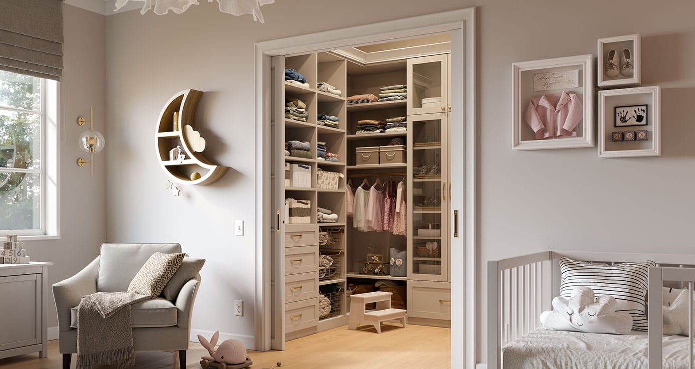 Girls closet designed with step up to storage drawers, shelves and wardrobe by California Closets