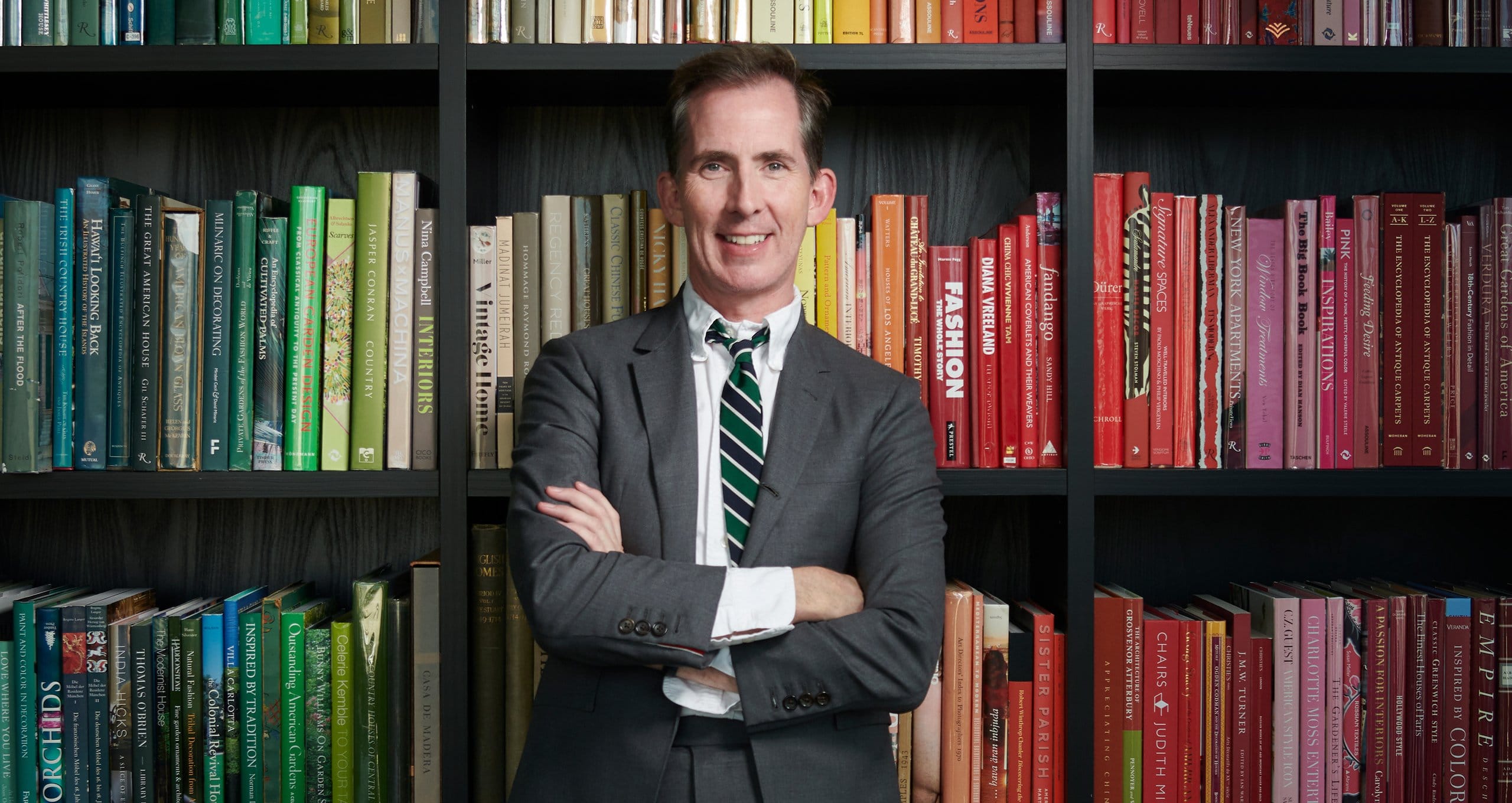 Kevin Sharkey's customized bookshelves in dark finish created by California Closets